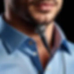 A clip-on microphone attached to a shirt collar